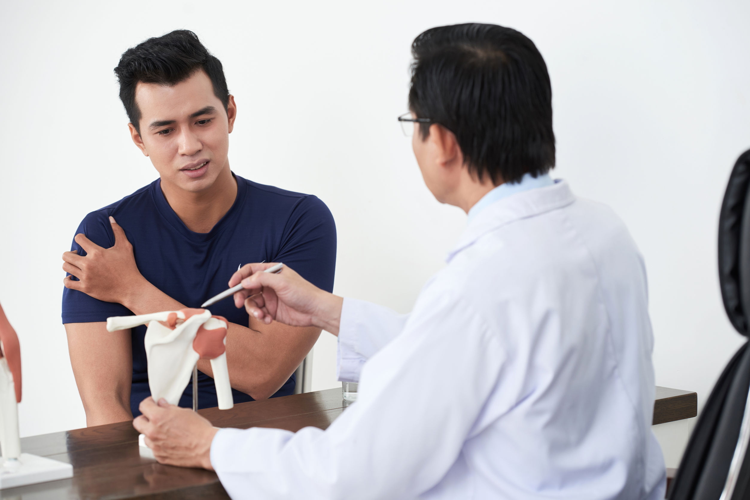 doctor and patient discussing medical issue