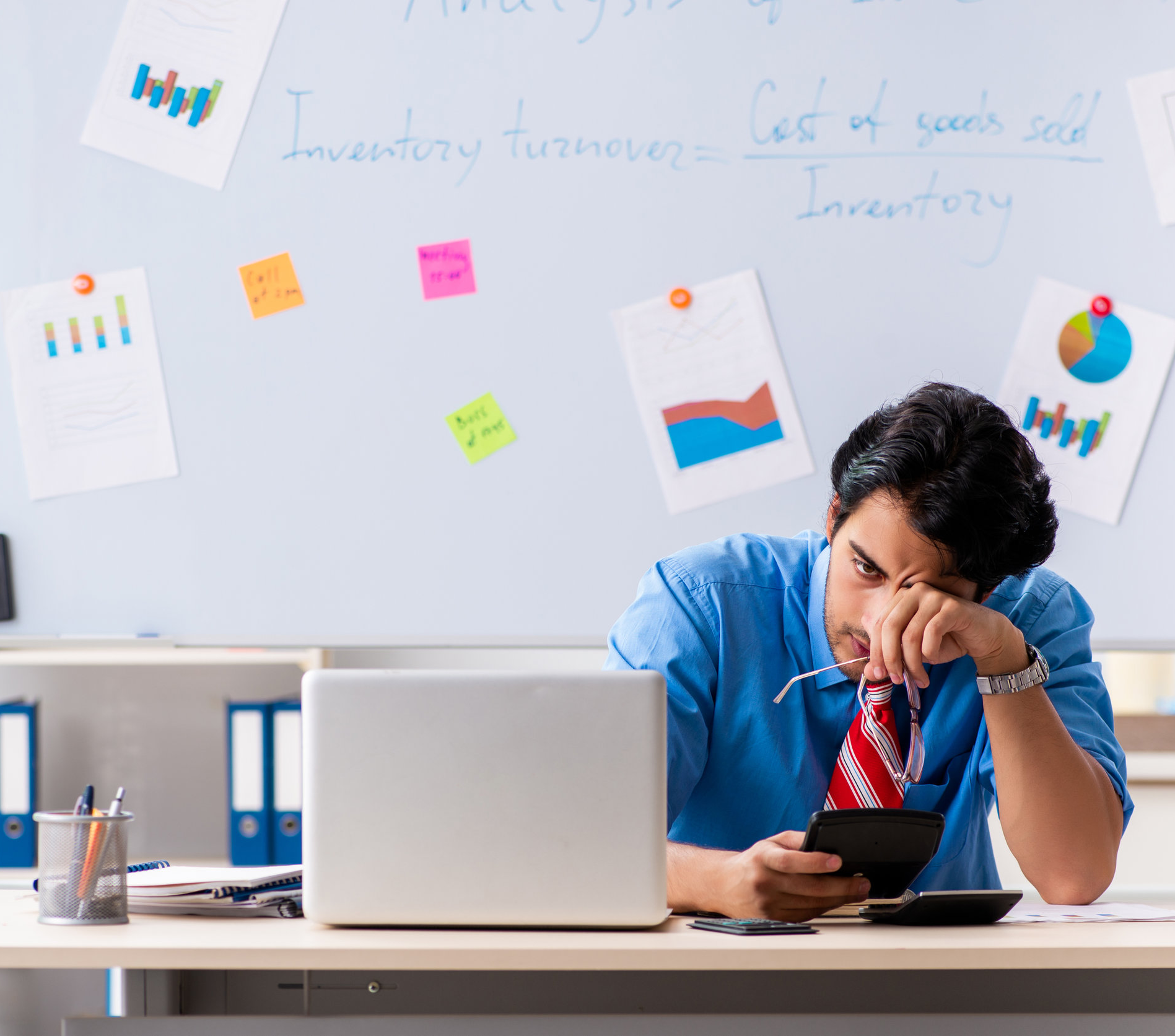 Man trying to wake up at his desk