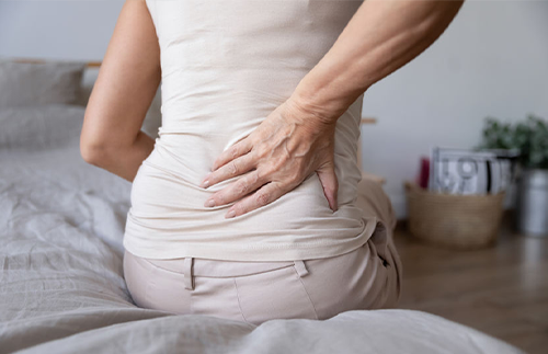 woman experiencing back pain