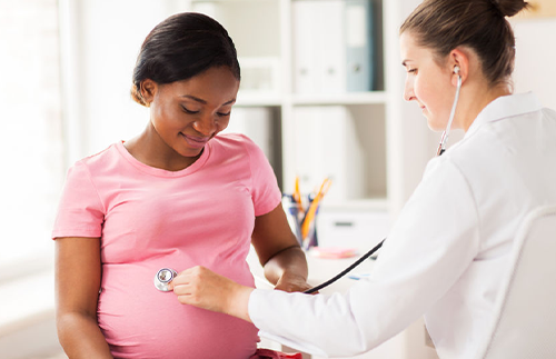 Pregnant Woman with doctor