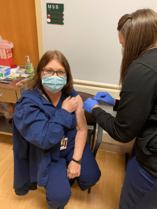 CCMH employee receiving COVID-19 vaccine