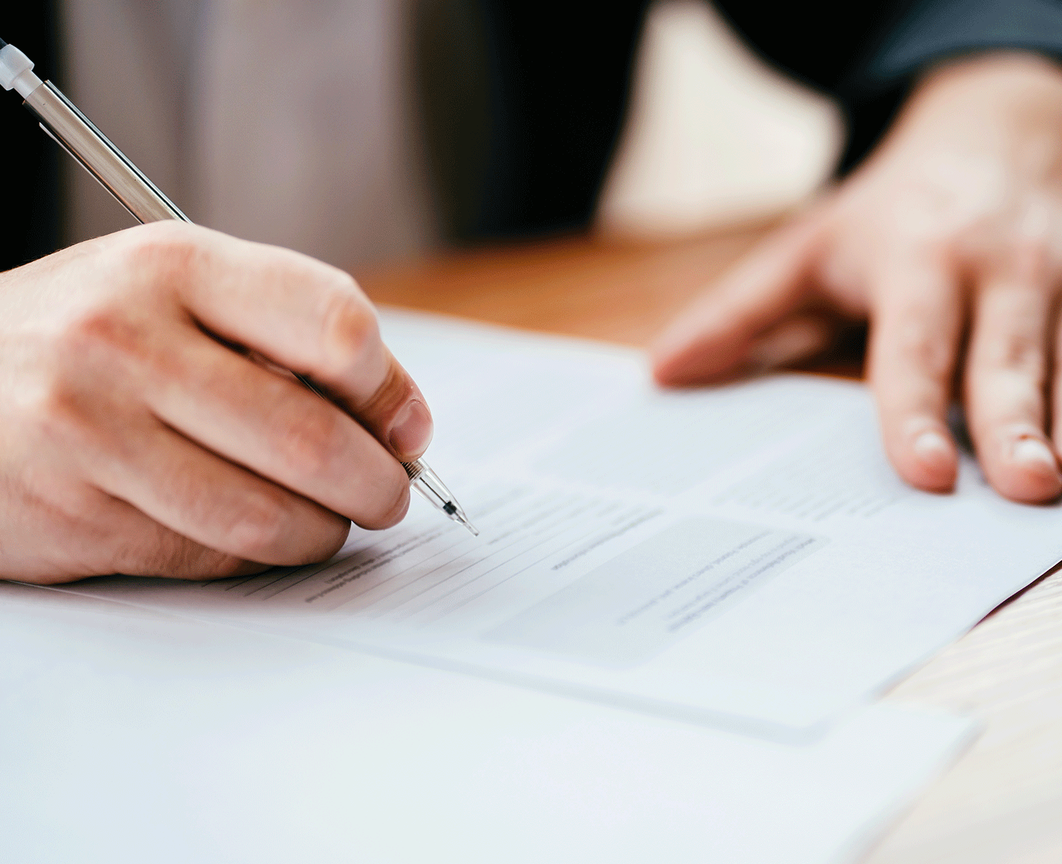 Patient signing paperwork