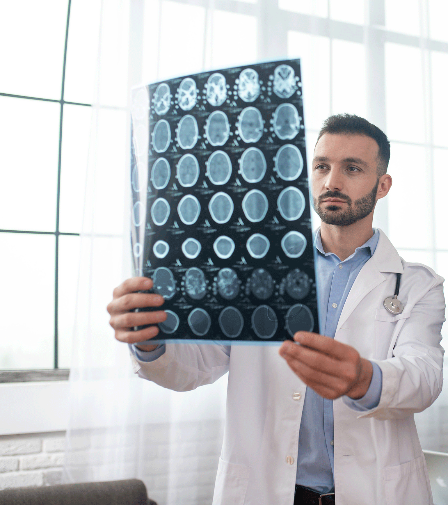 Neurologist examining an x-ray